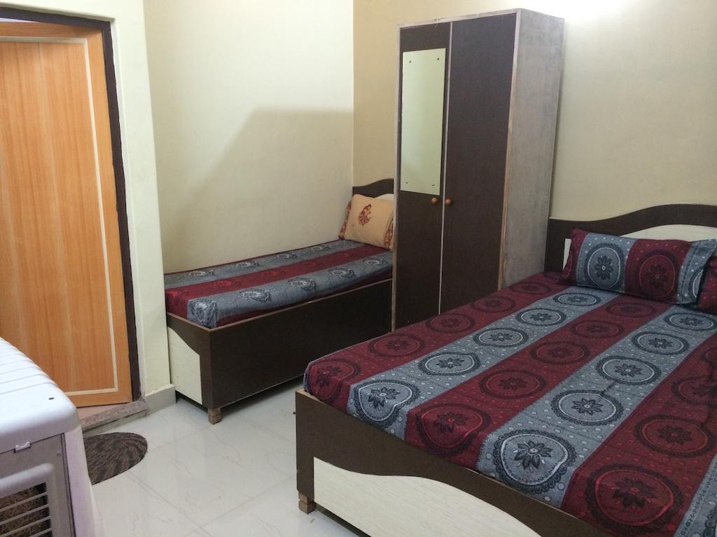 Hotel Pragya International Варанаси Номер фото