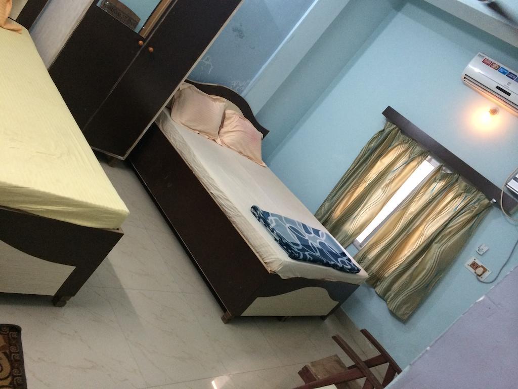 Hotel Pragya International Варанаси Номер фото